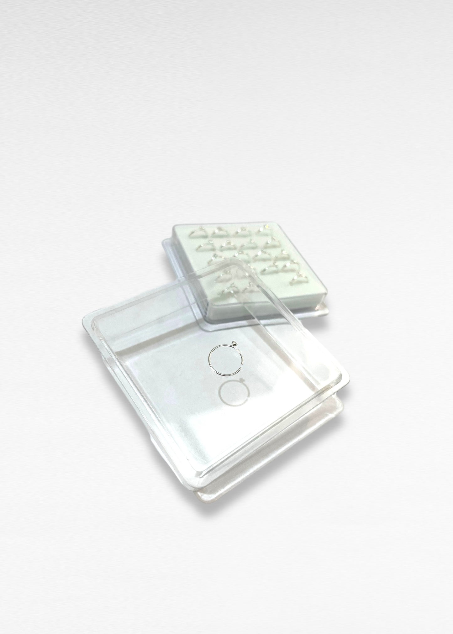 Plata 925_Argolla de nariz con punto de luz