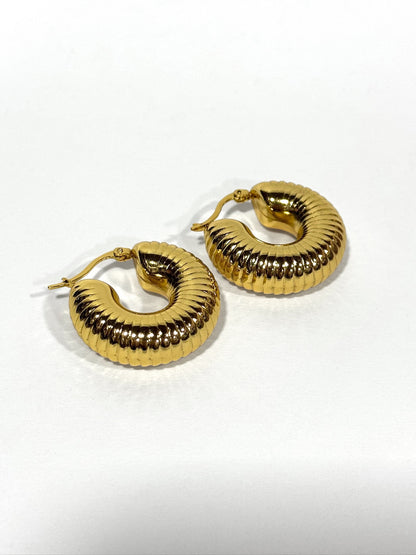 Aros de acero modelo #651 dorado
