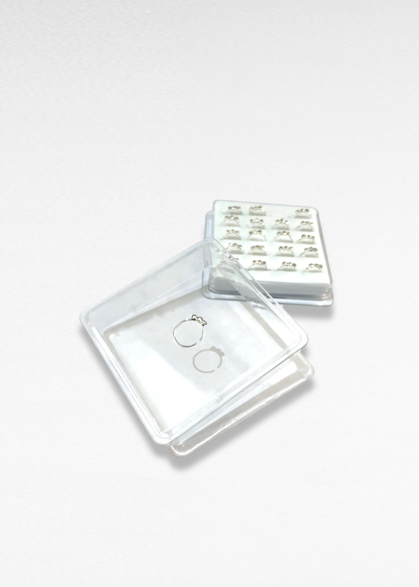 Plata 925_Argolla de nariz con 3 puntos de luz