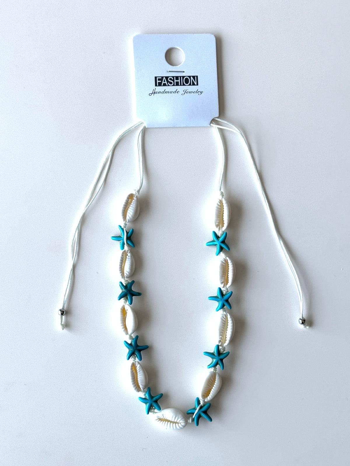 Collar de concha estrella azul Docena